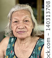 Portrait of an elderly Asian woman, with gray or white hair 140313708