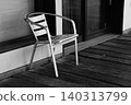 Aluminum chairs placed on a wooden terrace 140313799