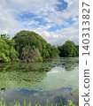 The pond in Itoshima, surrounded by fresh greenery. 140313827