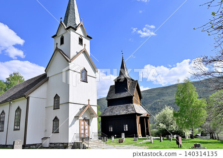 The wooden church, the white Torpo Church, and the historic Torpo Stave Church. The wooden church, the white Torpo Church, and the historic Torpo Stave Church. 140314135