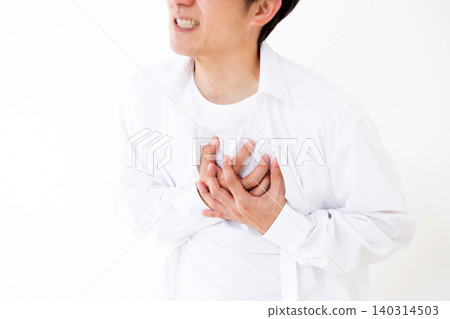 Middle-aged man suffering from chest pain Middle-aged man suffering from chest pain 140314503
