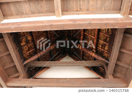 The ceiling of an old thatched roof 140315786