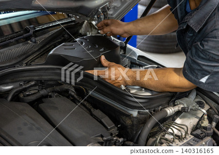 Automotive mechanics working in a car repair shop: Vehicle inspection and maintenance 140316165