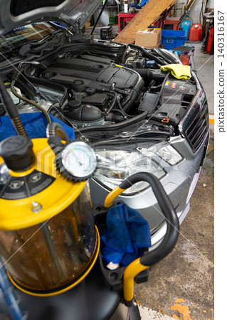 Automotive mechanics working in a car repair shop: Vehicle inspection and maintenance Automotive mechanics working in a car repair shop: Vehicle inspection and maintenance 140316167