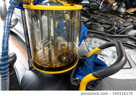 Automotive mechanics working in a car repair shop: Vehicle inspection and maintenance Automotive mechanics working in a car repair shop: Vehicle inspection and maintenance 140316170