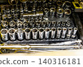 Automotive mechanics working in a car repair shop: Vehicle inspection and maintenance 140316181