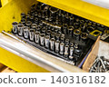 Automotive mechanics working in a car repair shop: Vehicle inspection and maintenance 140316182