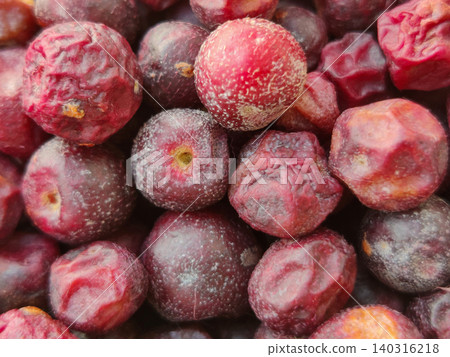 Phalsa fruit closeup revealing rich purple skin and natural texture Phalsa fruit closeup revealing rich purple skin and natural texture 140316218