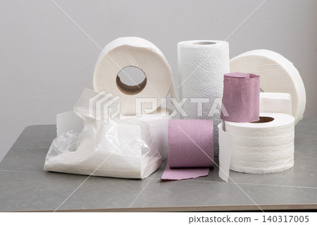 Rolls Of Toilet Paper Towels Hygiene. Roll on gray background Rolls Of Toilet Paper Towels Hygiene. Roll on gray background 140317005