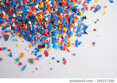 Plastic colorful pieces recycling shredded for industrial use. Plastic colorful pieces recycling shredded for industrial use. 140317166