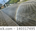 Fountain installed on the sidewalk 140317495