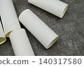 Toilet paper rolls placed haphazardly 140317580