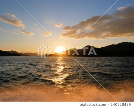 The Seto Inland Sea at dusk, off the coast of Mihara, Hiroshima Prefecture The Seto Inland Sea at dusk, off the coast of Mihara, Hiroshima Prefecture 140318489