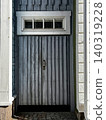 Timeworn Wooden Door of Entrance to Old House. Timeworn Wooden Door of Entrance to Old House. 140319228