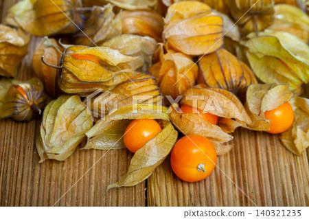 Physalis peruviana fruit on wooden table closeup 140321235