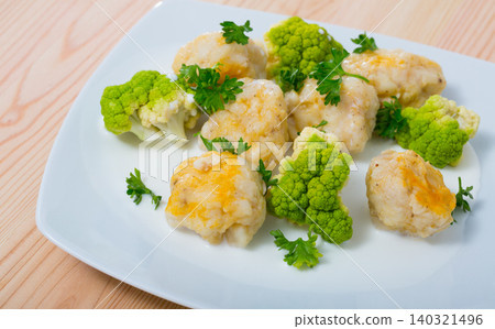 Fish balls of different white fish at plate with brokkoli, dish of Norwegian cuisine Fish balls of different white fish at plate with brokkoli, dish of Norwegian cuisine 140321496