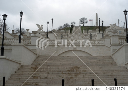Mithridates Staircase in Kerch. Ancient stone steps lead to the top of Mount Mithridates. Mithridates Staircase in Kerch. Ancient stone steps lead to the top of Mount Mithridates. 140321574