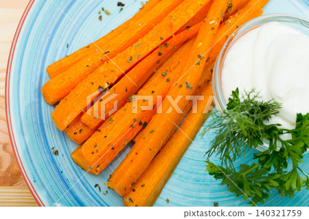 Carrot sticks with sour cream 140321759