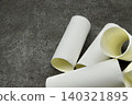 Toilet paper rolls placed haphazardly 140321895