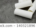 Toilet paper rolls placed haphazardly 140321896