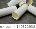 Toilet paper rolls placed haphazardly 140321938