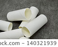 Toilet paper rolls placed haphazardly 140321939