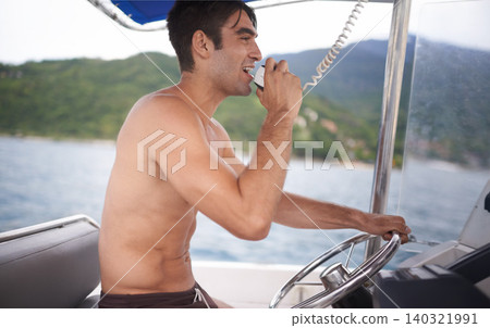 Man, boat and sailing ocean with radio communication or navigation on coastal water or direction, location or voyage. Male person, steering wheel and marine conversation at sea, transport or nautical Man, boat and sailing ocean with radio communication or navigation on coastal water or direction, location or voyage. Male person, steering wheel and marine conversation at sea, transport or nautical 140321991