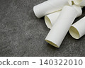Toilet paper rolls placed haphazardly 140322010