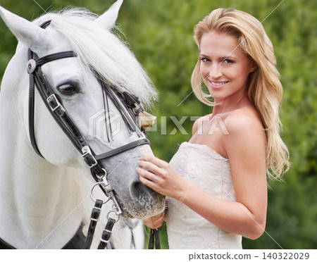 Wedding, woman and portrait with horse outdoor for celebration, marriage and confidence in countryside. Bride, person and stallion on lawn in field with smile, dress and animal at ceremony in nature Wedding, woman and portrait with horse outdoor for celebration, marriage and confidence in countryside. Bride, person and stallion on lawn in field with smile, dress and animal at ceremony in nature 140322029