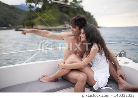 Couple, boat and travel on ocean on vacation, love and relax by water on summer holiday. People, cruise and bonding for relationship in outdoors, support and care on weekend trip to sea on yacht Couple, boat and travel on ocean on vacation, love and relax by water on summer holiday. People, cruise and bonding for relationship in outdoors, support and care on weekend trip to sea on yacht 140322322