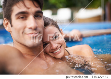 Happy couple, portrait and swimming pool for travel break or Hawaii vacation for honeymoon, bonding or stress relief. Man, woman and embrace for hotel weekend in summer for trip, outdoor or peace Happy couple, portrait and swimming pool for travel break or Hawaii vacation for honeymoon, bonding or stress relief. Man, woman and embrace for hotel weekend in summer for trip, outdoor or peace 140322387