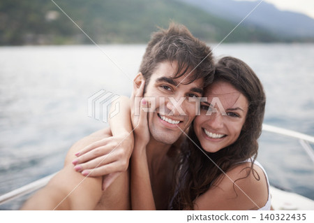 Portrait, selfie and happy couple at ocean on boat for vacation, holiday or travel together outdoor. Face, woman and man taking pictures at sea for adventure, hug and connection in summer on a ship Portrait, selfie and happy couple at ocean on boat for vacation, holiday or travel together outdoor. Face, woman and man taking pictures at sea for adventure, hug and connection in summer on a ship 140322435