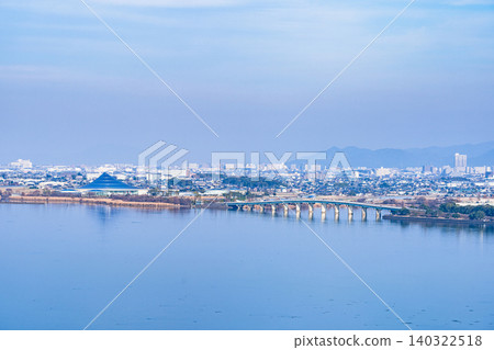 Kusatsu City, a city on the shores of Lake Biwa, is a commuter town and satellite city of Kyoto and Osaka [Urban landscape in Shiga Prefecture] 140322518