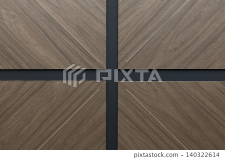 Cross grid pattern on dark walnut wood panels Cross grid pattern on dark walnut wood panels 140322614