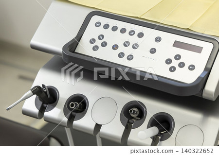 Full view of the control panel of the silver dental unit. Full view of the control panel of the silver dental unit. 140322652