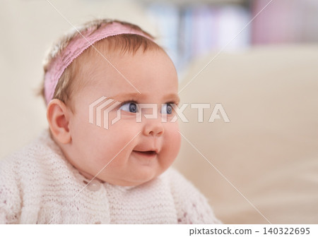 Happy, baby girl and face in a home with a calm, relax and sweet infant in a living room. Youth, child and house with toddler clothing in the morning ready for a nap on the sofa with joy and headband Happy, baby girl and face in a home with a calm, relax and sweet infant in a living room. Youth, child and house with toddler clothing in the morning ready for a nap on the sofa with joy and headband 140322695