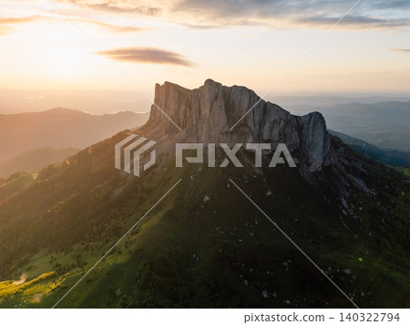 Aerial view of national park Bolshoy Tkhach mountain in Caucasus with sunset tones Aerial view of national park Bolshoy Tkhach mountain in Caucasus with sunset tones 140322794