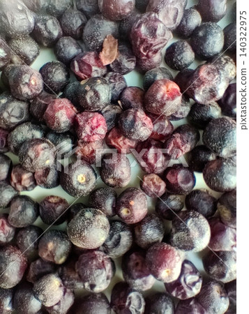 Phalsa berries closeup showing natural texture and ripe fruit details Phalsa berries closeup showing natural texture and ripe fruit details 140322975