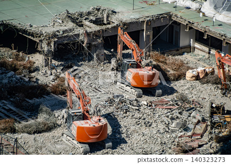 Aerial view of the demolition work of a high-rise building. Aerial view of the demolition work of a high-rise building. 140323273