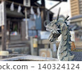 A dragon statue at the purification fountain of a shrine 140324124