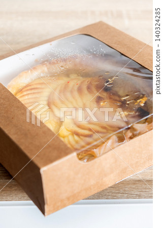 Homemade apple pie in a cardboard box. Homemade apple pie in a cardboard box. 140324285