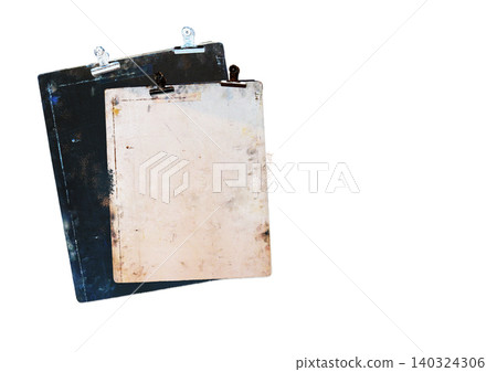 Vintage clipboards with scratched and stained surfaces highlight their aged, industrial character, isolated on white background Vintage clipboards with scratched and stained surfaces highlight their aged, industrial character, isolated on white background 140324306