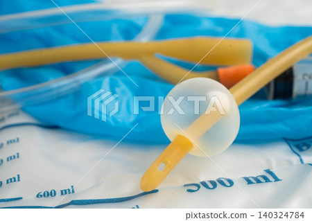 Foley catheter and urine drainage bag collect urine for disability or patient in hospital. Foley catheter and urine drainage bag collect urine for disability or patient in hospital. 140324784