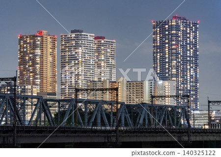 Night view of the tower apartment buildings in Musashi-Kosugi from the Tamagawa riverbed. 140325122