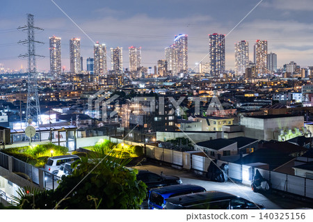 Night view of the high-rise tower apartment complexes of Musashi-Kosugi from a hilltop in Kawasaki City Night view of the high-rise tower apartment complexes of Musashi-Kosugi from a hilltop in Kawasaki City 140325156