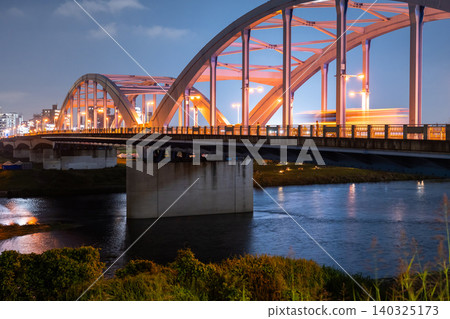 Night view of the arch bridge of Maruko Bridge over the Tama River Night view of the arch bridge of Maruko Bridge over the Tama River 140325173