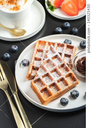 Belgium waffles Homemade waffles with strawberries Belgium waffles Homemade waffles with strawberries 140325430