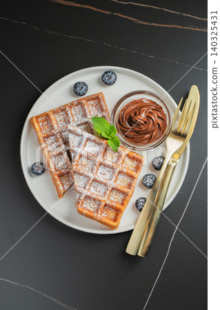 Belgium waffles Homemade waffles with strawberries Belgium waffles Homemade waffles with strawberries 140325431