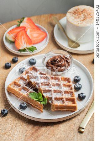 Belgium waffles Homemade waffles with strawberries Belgium waffles Homemade waffles with strawberries 140325432