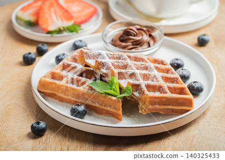 Belgium waffles Homemade waffles with strawberries 140325433
